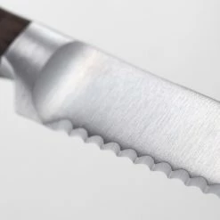 Wusthof Cutlery Wusthof Crafter 5" Serrated Utility Knife 13 Wusthof Cutlery Wusthof Crafter 5" Serrated Utility Knife -Le Creuset sales crafter serration detail