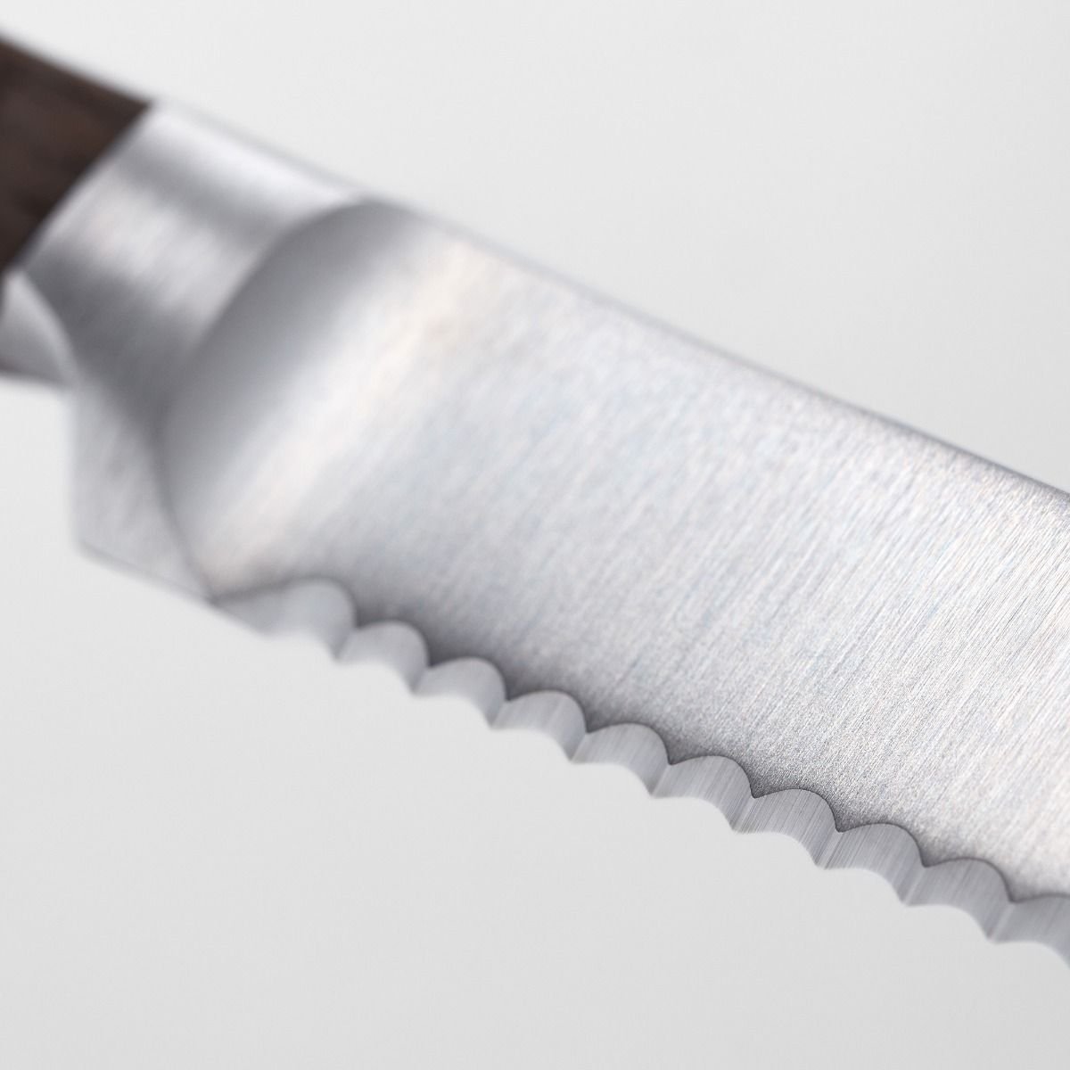 Wusthof Crafter 5" Serrated Utility Knife Wusthof Cutlery Wusthof Crafter 5" Serrated Utility Knife -Le Creuset sales crafter serration detail