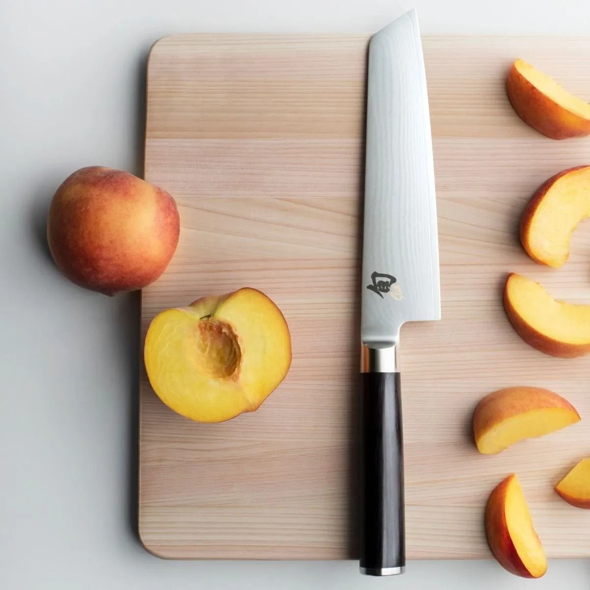 Shun Classic 6.5" Master Utility Knife Shun Cutlery Shun Classic 6.5" Master Utility Knife -Le Creuset sales dm0782 peach lifestyle